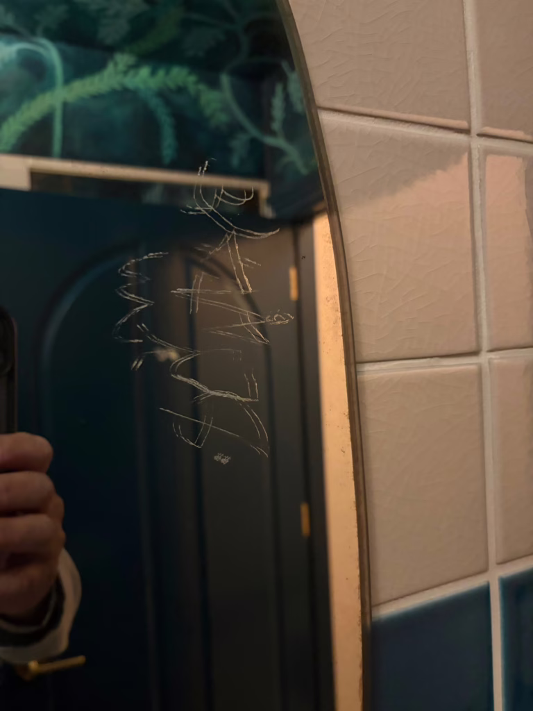 Antique Mirror with scratch graffiti damage