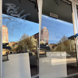 before and after side by side of acid etch graffiti removal