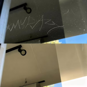 scratch graffiti tag present on glass before and after side by side