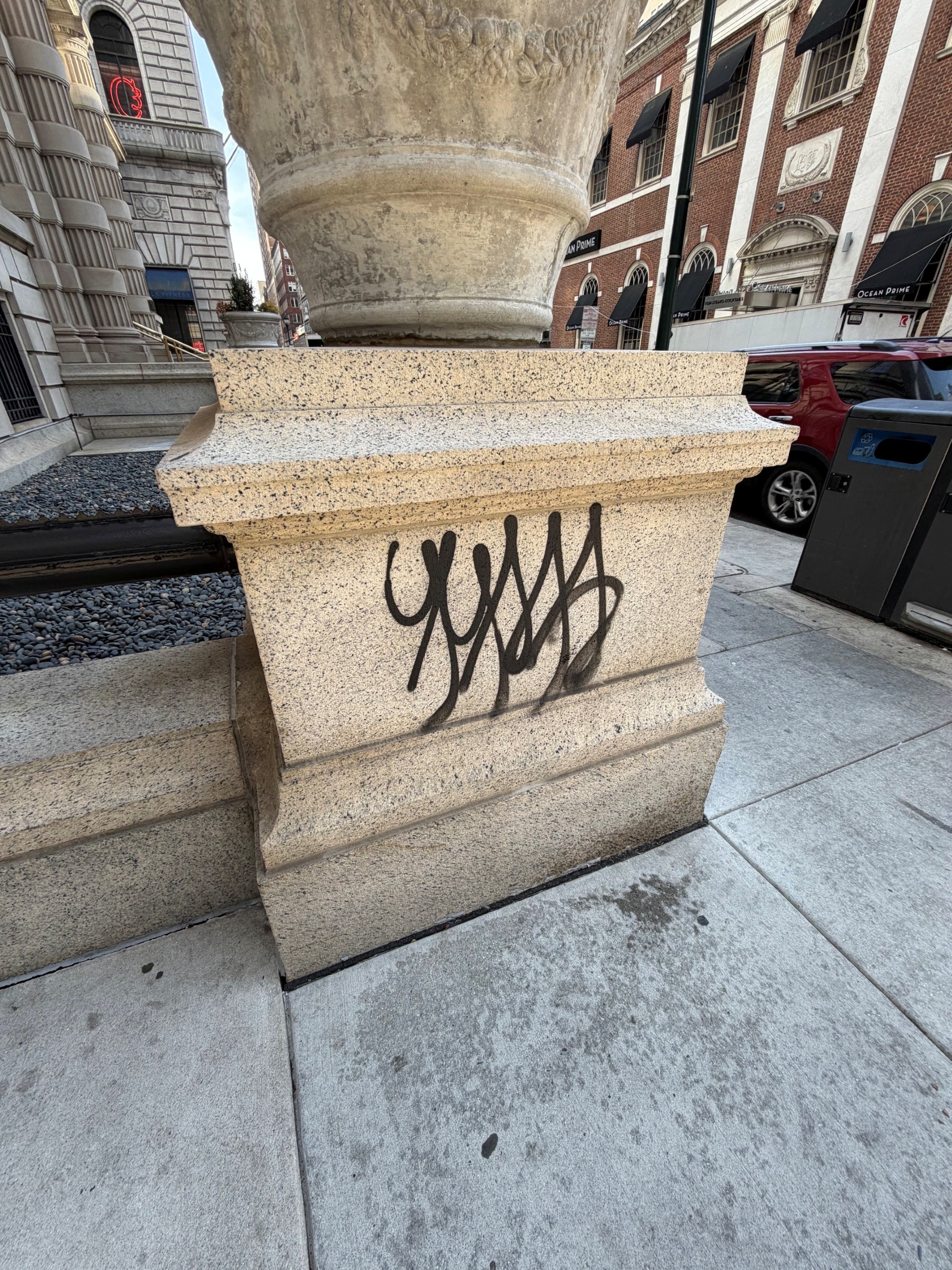 before pic of graffiti on granite